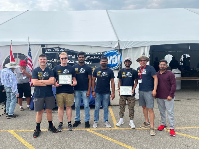 Kettering University students with their awards from the 2023 IGVC.
